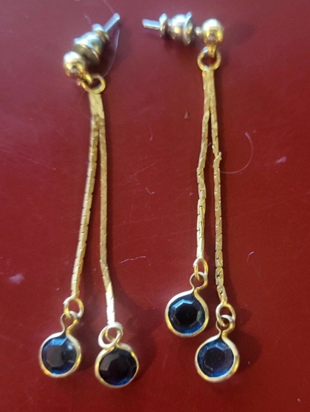 Gold Tone and blue dangle drop earrings
